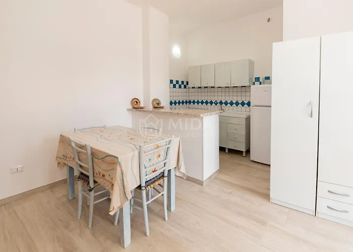 La Maison A La Апартаменты Порто-Чезарео